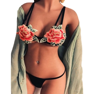 Lace lingerie set featuring unique floral embroidery and matching mint green mesh cover-up