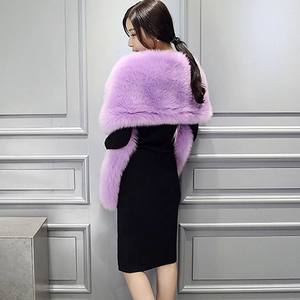 Close-up of lavender faux fur shawl showing fluffy texture on a black slim dress