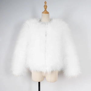 Close-up of pure white faux ostrich feather jacket showing fluffy texture and soft fur details