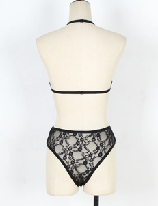 Rear view of black floral lace lingerie set featuring high-waisted briefs and strappy bra