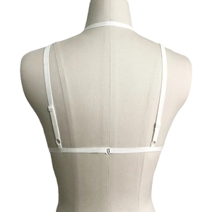 Bralette en dentelle blanche avec fines bretelles réglables et fermeture au dos