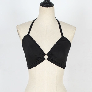 Close-up of black halter crop top featuring a silver metal ring and ruched chest detail