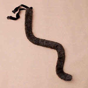 Detail of adjustable faux fur cat tail in dark grey and black with plastic buckle strap