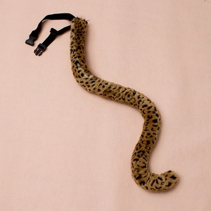 Detailed view of leopard print plush cat tail with adjustable black waist strap buckle