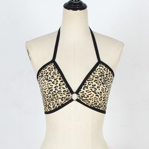 Detailed view of leopard print bikini top with halter neck and central metal ring