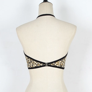 Detailed back view of leopard print tube top with silver metal clasp and V-shaped cut