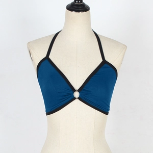 Detail of blue halter top featuring a V-neckline with silver metal ring and contrast piping