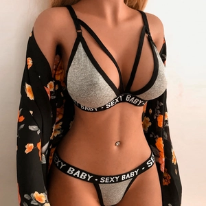 Detail of grey cotton lingerie set featuring black elastic band with SEXY BABY lettering