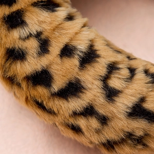 Macro shot of high-quality leopard print faux fur texture with soft and dense fibers
