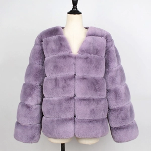 Luxurious purple faux fur jacket with stylish square patchwork design on white background