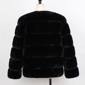 Rear view of a black faux fur jacket featuring horizontal segmented stitching and a collarless design