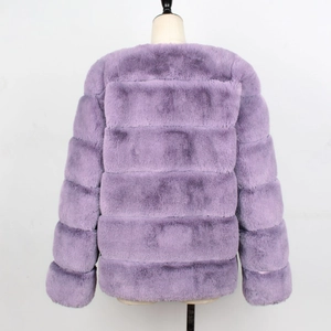 Rear view of a plush purple faux fur jacket showing soft horizontal panels and loose fit