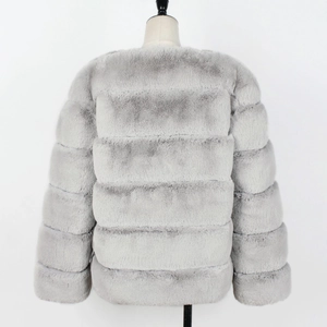 Detail of grey faux fur jacket featuring horizontal striped stitching and a loose fit