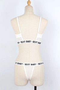 Rear view of white lingerie set with SEXY BABY letter print elastic bands on mannequin