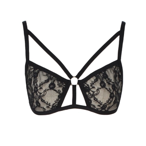 Macro shot of black lace bra detail with mesh fabric and silver metal ring decoration