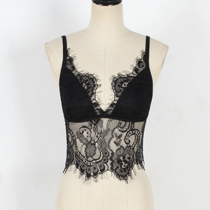 Close-up of black floral lace camisole with deep V-neck and eyelash lace details