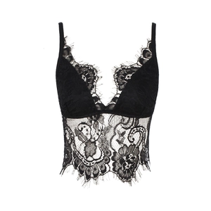 Detail of black lace camisole featuring deep V-neck, floral embroidery and eyelash trim
