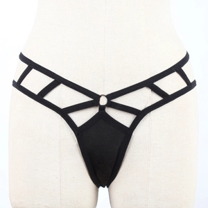 Detail view of black strappy thong with geometric cut-outs and metal ring connector