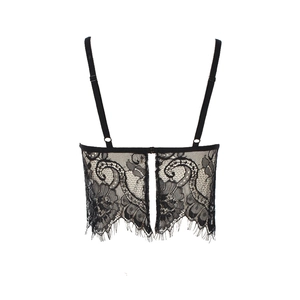 Detail view of black lace bralette with floral patterns and delicate eyelash lace trim