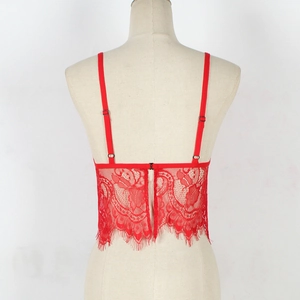 Detail view of red floral lace camisole back with adjustable straps and hook closure