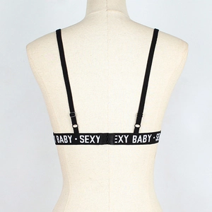 Detail of sexy black bralette back with adjustable straps and SEXY BABY elastic band