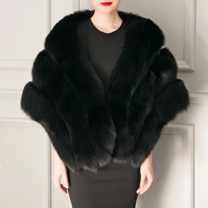Close-up of elegant black faux fur shawl with thick plush texture for bridal evening wear