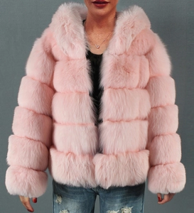 Detailed close-up of pink faux fur hooded jacket with horizontal stripe stitching