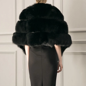 Rear view of a premium black faux fur bridal cape with thick layered texture for winter