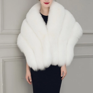 Detailed view of plush white faux fur shawl featuring an elegant wide lapel collar style