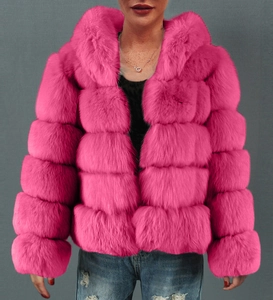 Close-up of rose red faux fur jacket featuring a horizontal tiered design and hood