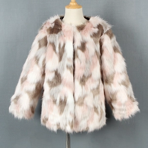 Detailed view of kids' faux fur coat featuring a soft pink, grey, and cream patchwork texture