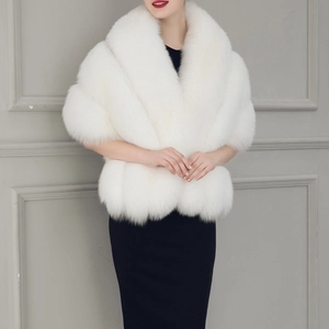 Detailed view of luxury white faux fur bridal shawl with dense texture and plush collar