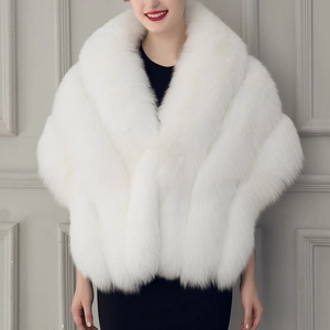 Close-up of elegant white faux fox fur bridal shawl with premium fluffy texture