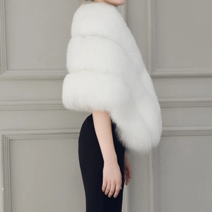 Detailed side view showing white faux fur shawl layers and fluffy texture for wedding