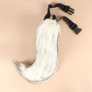 Close-up of fluffy faux fox tail accessory with adjustable black waist belt buckle