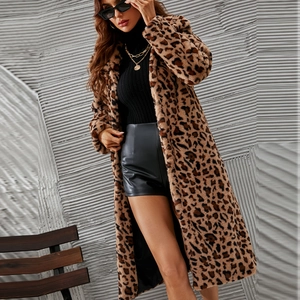 Close-up of leopard print faux fur coat featuring soft texture and stylish winter pattern