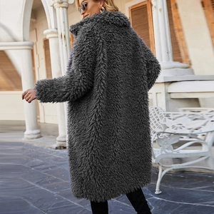 Women's oversize dark grey faux fur coat with plush texture and long sleeve lapel design