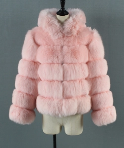 Close-up of light pink faux fur jacket showing fluffy tiered horizontal segments