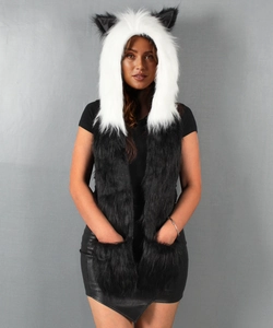 Close-up of faux fur animal hooded scarf with ears and built-in pockets in black and white