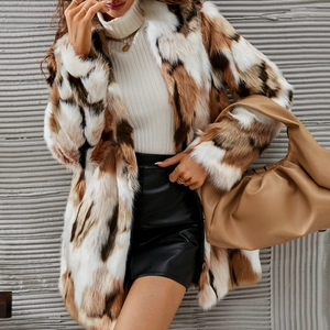 Close-up of multicolor faux fur coat texture with elegant shawl collar and plush finish