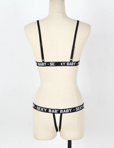 Rear view of contrast lingerie set with SEXY BABY elastic straps and adjustable straps