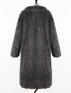Back view of a long dark grey faux fur coat with thick teddy texture for women