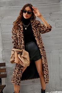 Detail view of long leopard print faux fur coat with square neck and premium plush texture