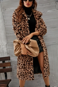 Detail shot of luxury faux fur leopard print coat featuring classic lapel design