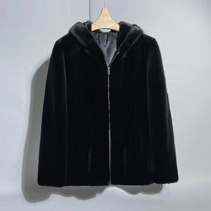 Detail of premium black faux fur hooded jacket featuring metal zipper and smooth lining