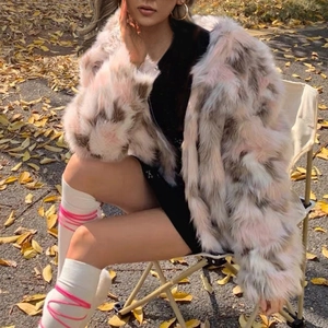 Chic multi-color faux fur jacket for women in pink and beige, perfect for autumn winter fashion