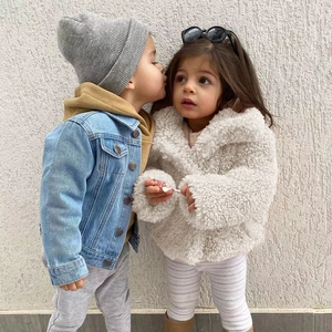 Cozy children's faux fur jacket and denim layer outfits for autumn and winter seasons