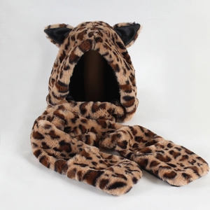 Macro shot of faux fur texture and cat ear detail on leopard print hooded scarf