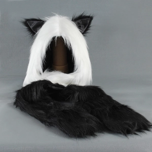 Detail view of animal hooded scarf with ears in black and white faux fur texture