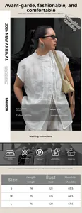 Tabla de tallas y detalles de camisa blanca de manga corta con bordado floral y cuello alto